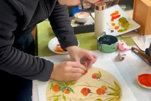 chinese art master painting fruit tree.webp