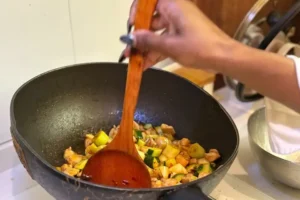 participant cooking kung pao chicken