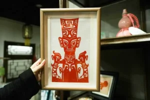 hand holding chinese paper craft