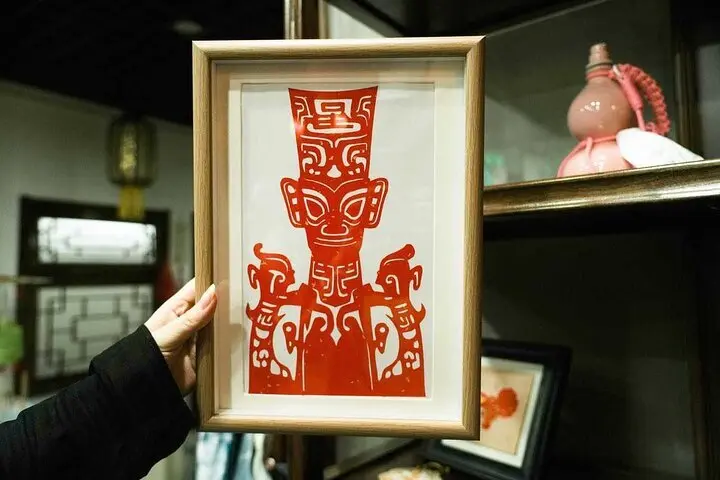 hand holding chinese paper craft